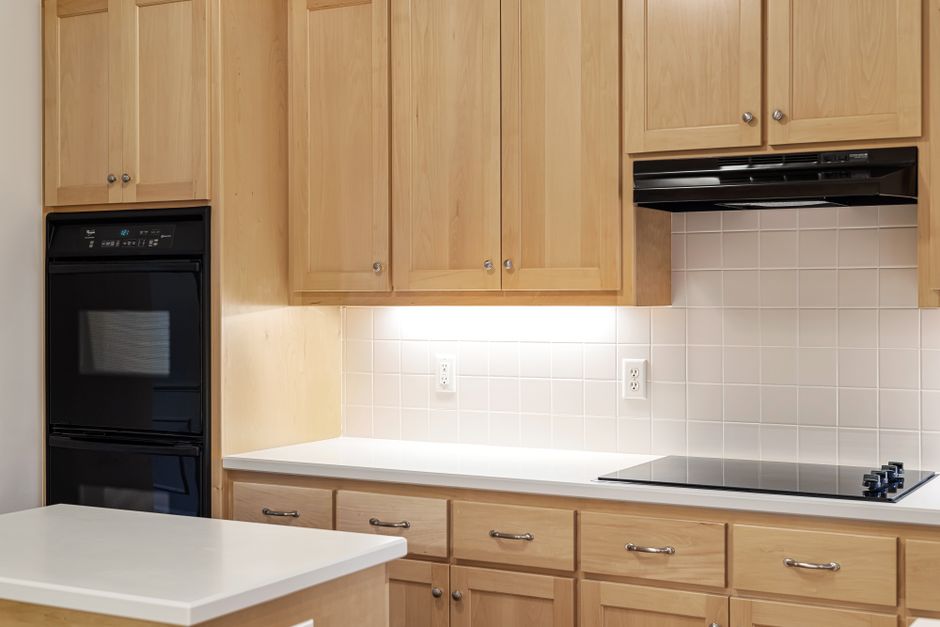 Wood cabinet doors and drawers in a clean modern home